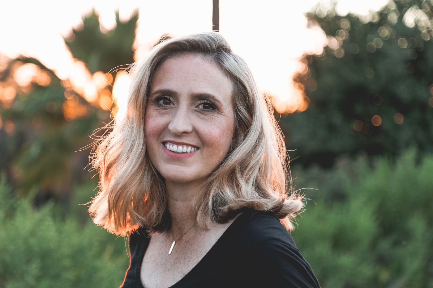 Portrait of a woman with natural skin texture in warm evening light