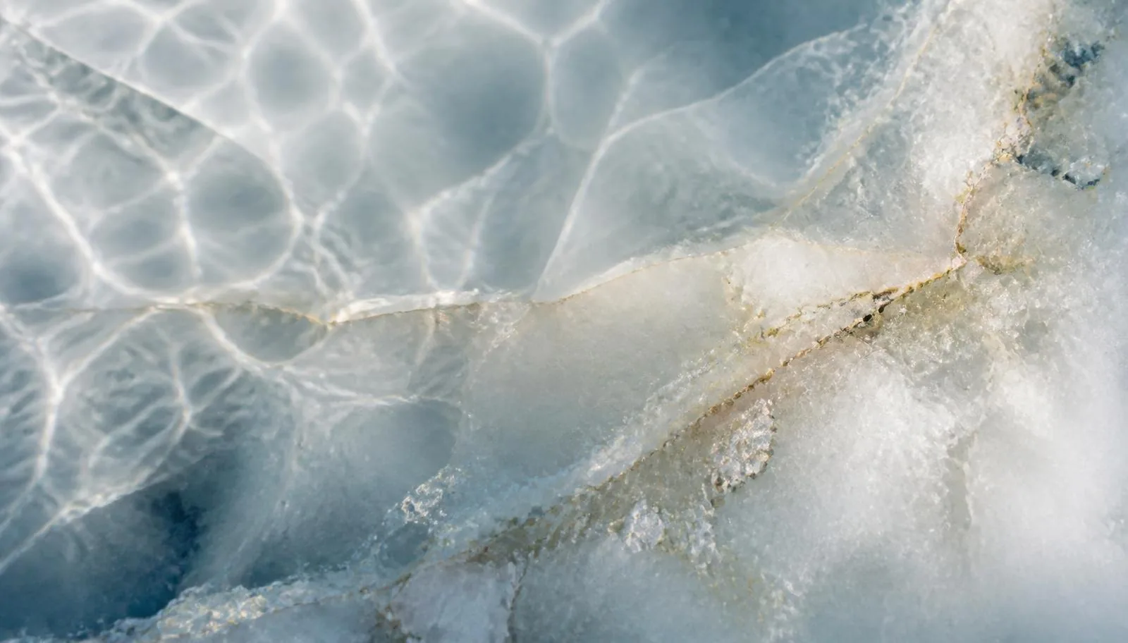 Mineral water over pale stone
