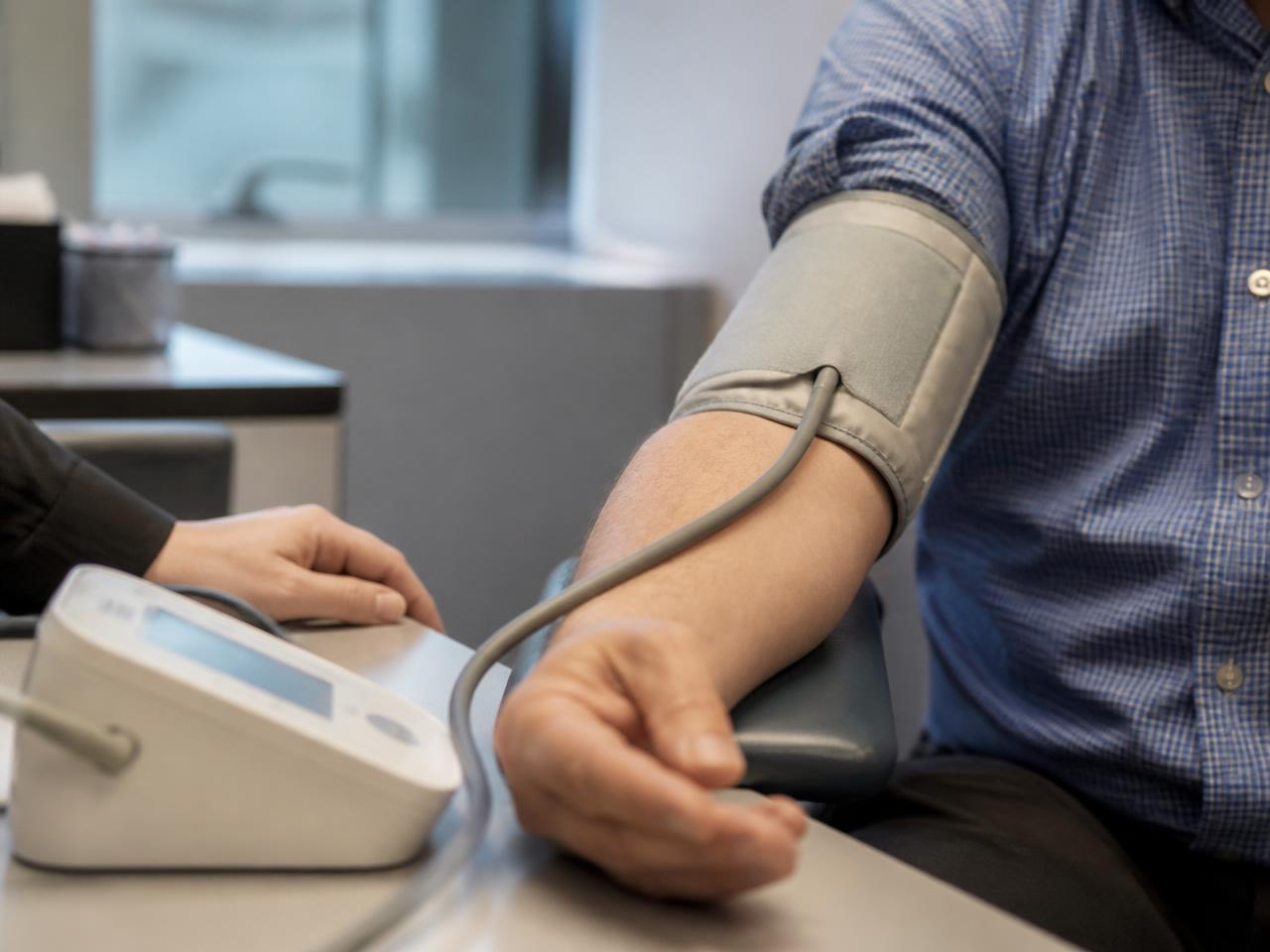 Blood-pressure cuff measurement during a clinical research visit