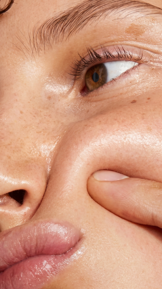 Healthy glowing skin in warm golden light
