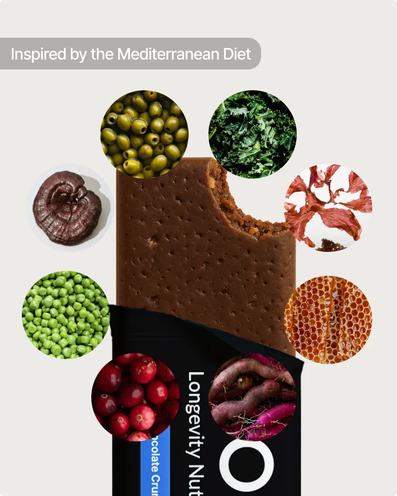 Unwrapped NOVOS Bar showing texture, surrounded by its whole-food ingredients